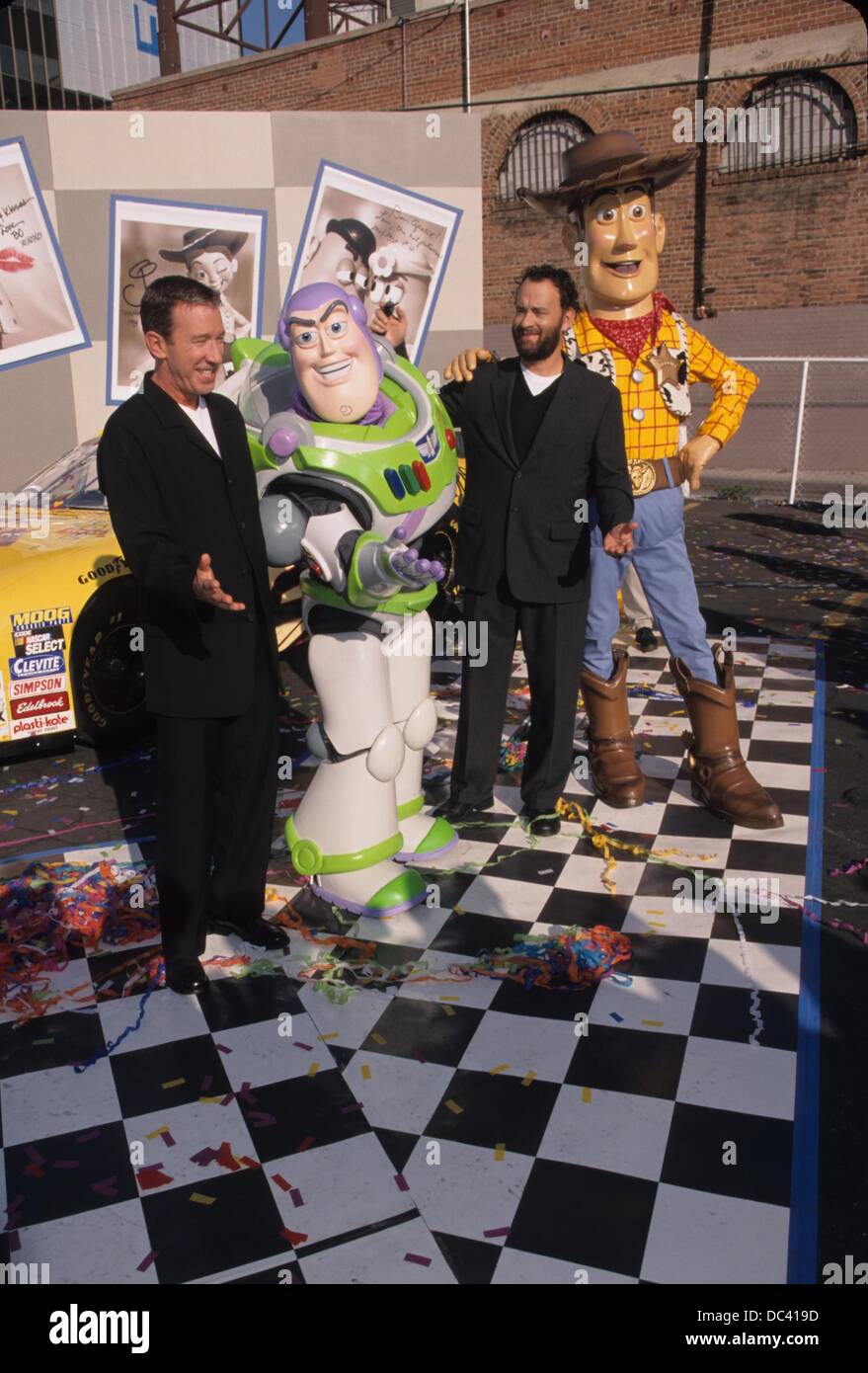 TOM HANKS with Tim Allen , Buzz Lightyear and Woody.Toy story and Nascars Unveiled in Hollywood 1999.k16934fb.(Credit Image: © Fitzroy Barrett/Globe Photos/ZUMAPRESS.com) Stock Photo