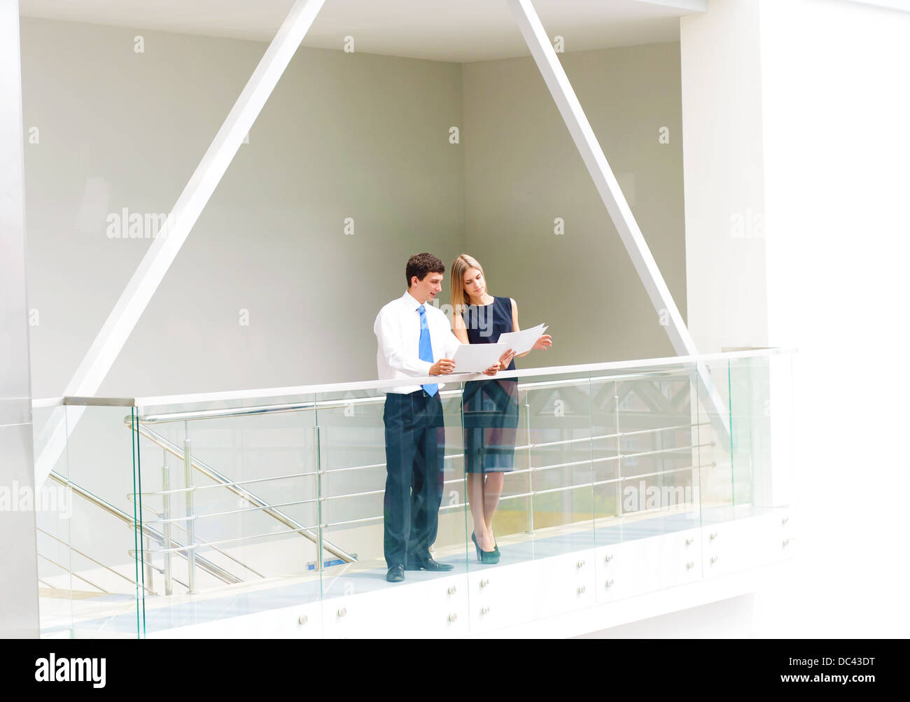 business man and business woman in office Stock Photo - Alamy