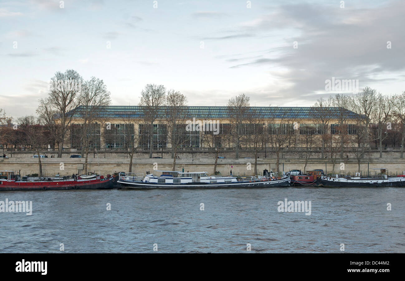 The Musée de l'Orangerie in the Tuileries Garden in Paris, as seen from the left bank of the Seine River, evening light. Stock Photo