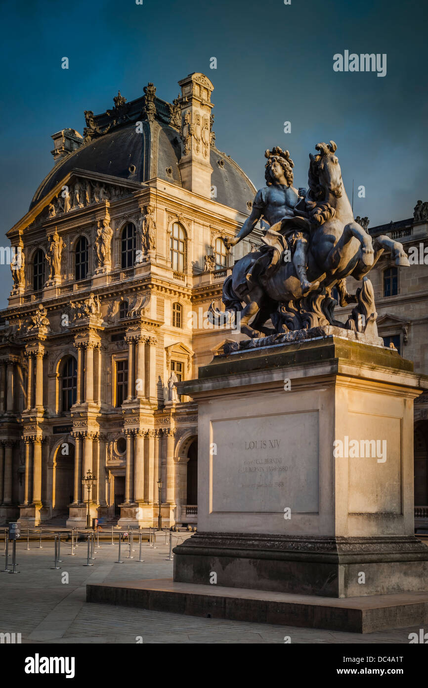 Louis XIV Statue in the courtyard of Musee du Louvre, Paris France Stock Photo