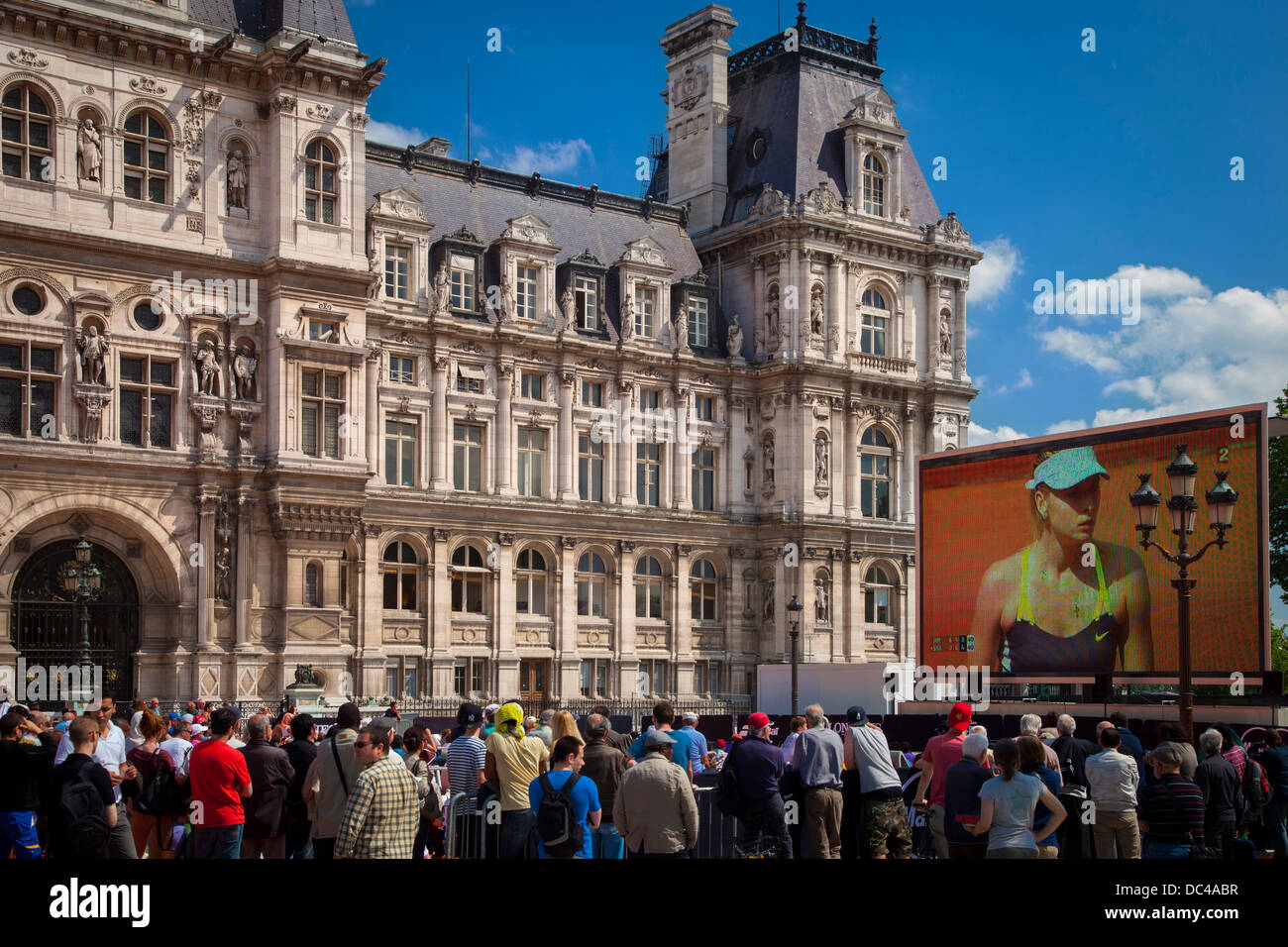 Watching Tennis Pro Sharapova on the Jumbo-Tron at Hotel de Ville during the French Open, Paris France Stock Photo