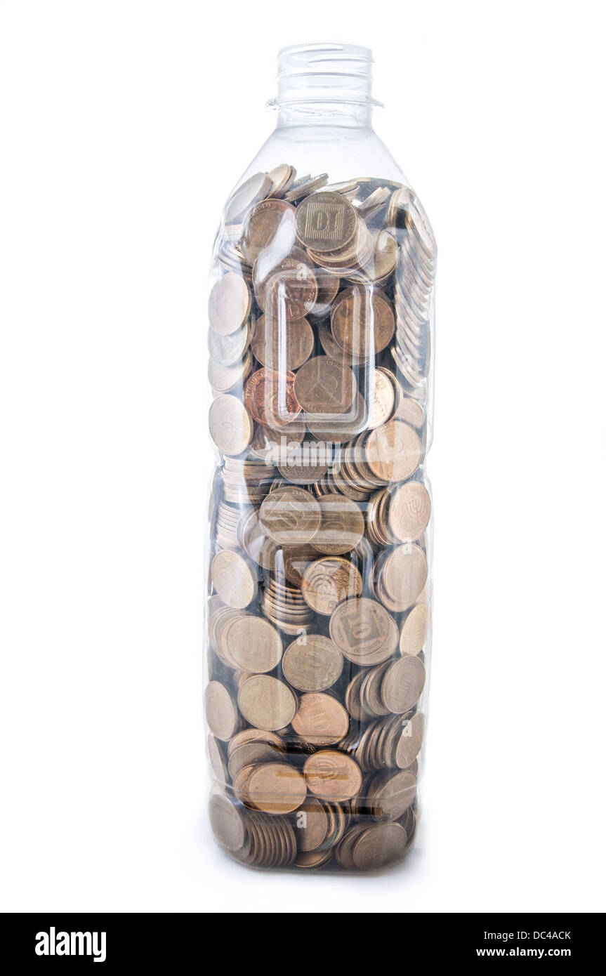 Plastic bottle with coins on white background Stock Photo Alamy