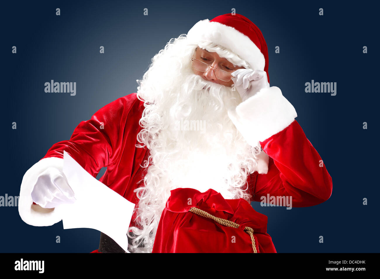 santa claus reading a letter Stock Photo