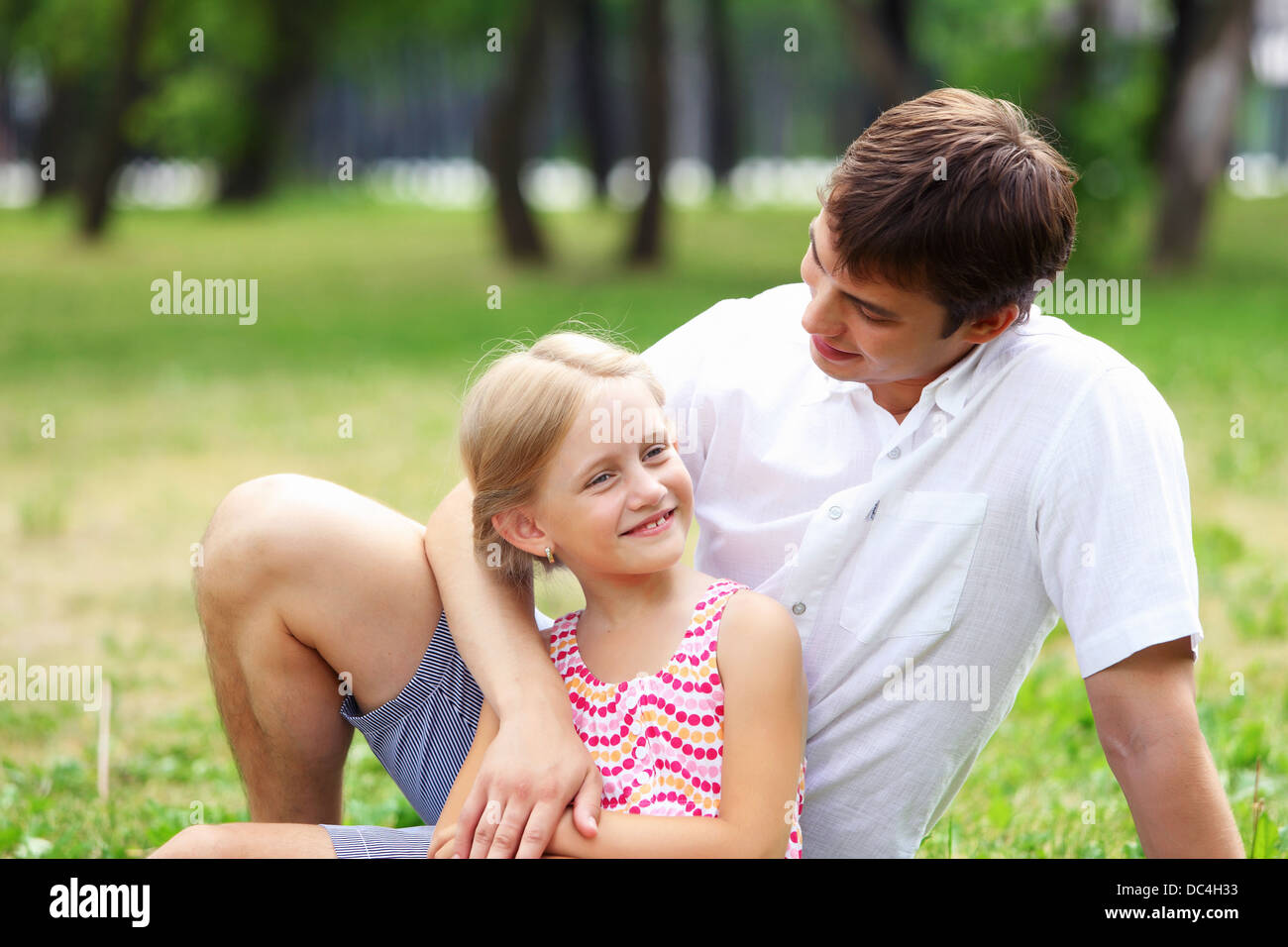 Father and daughter in the park Stock Photo - Alamy