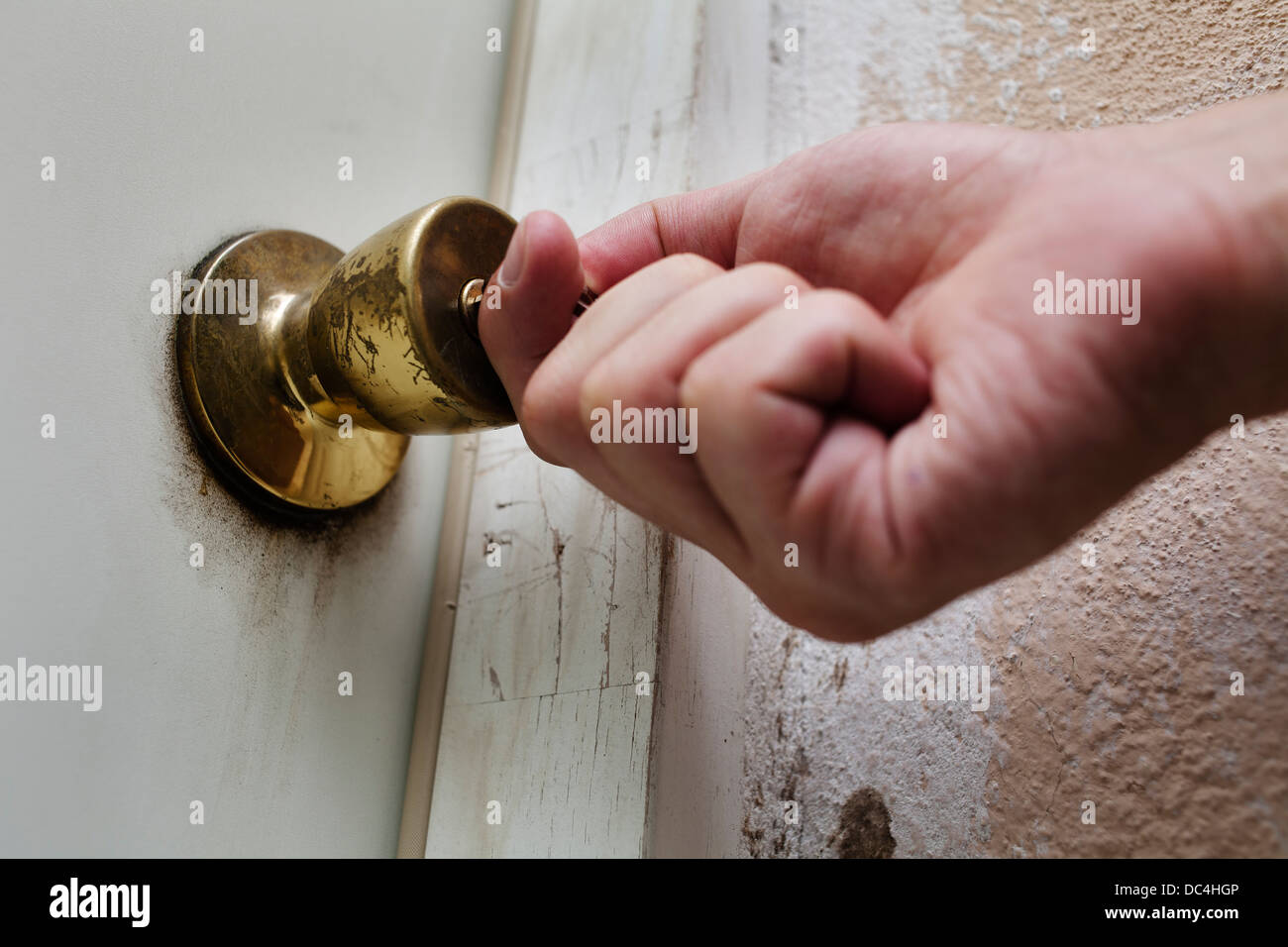 Unlocking or locking a door. Stock Photo