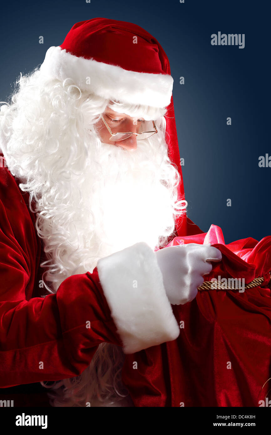santa claus with his gift bag Stock Photo - Alamy