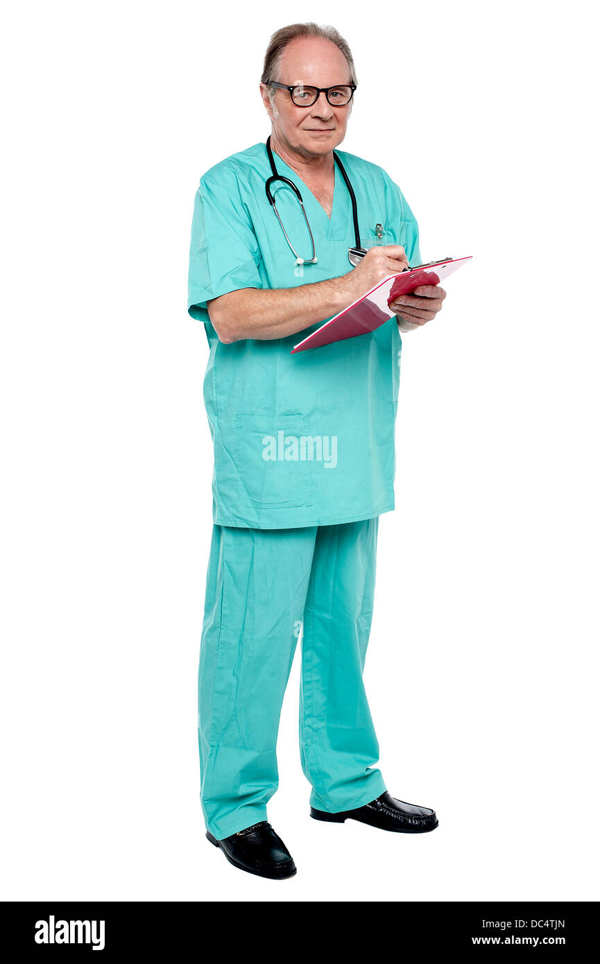 Male doctor in duty hours writing prescription Stock Photo - Alamy