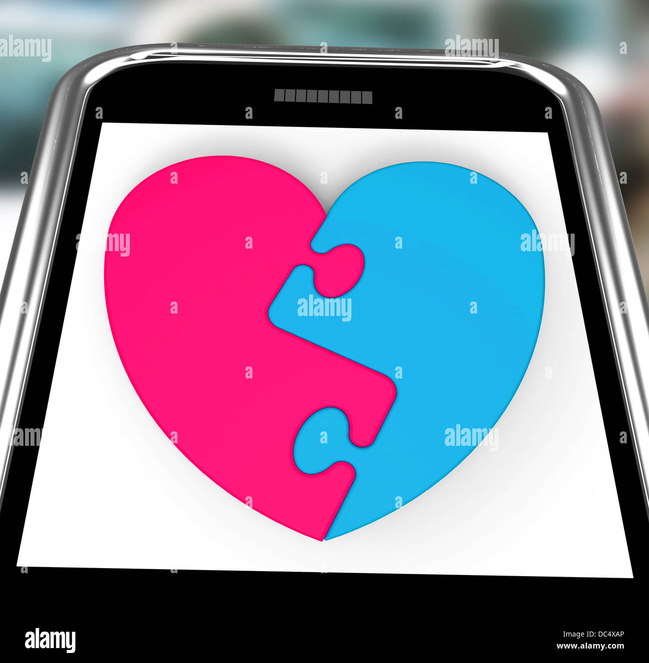 Two-Pieced Heart On Smartphone Showing Complement Stock Photo