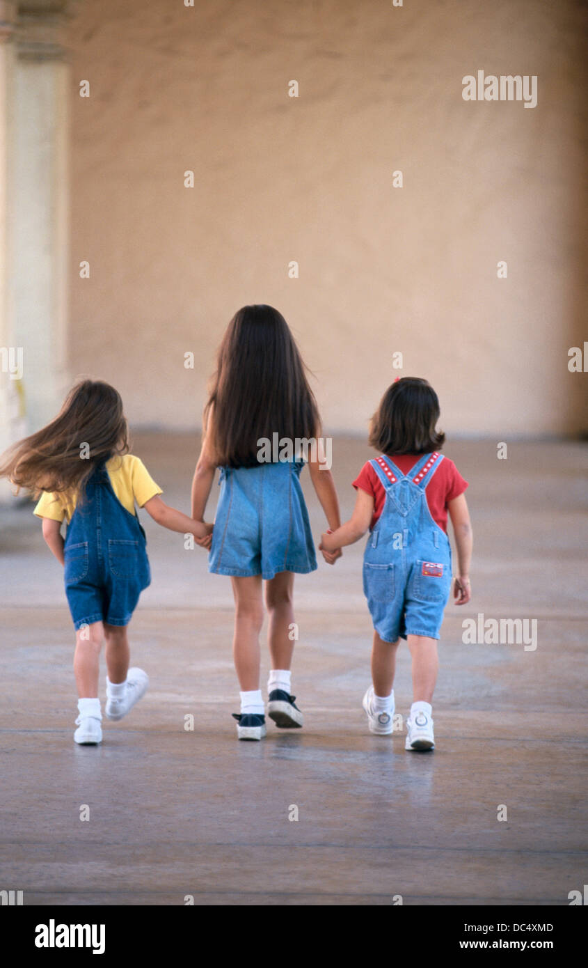 Three Little Girls Holding Hands
