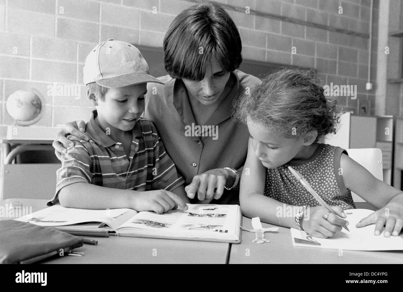 Female teacher talking to class Black and White Stock Photos & Images ...