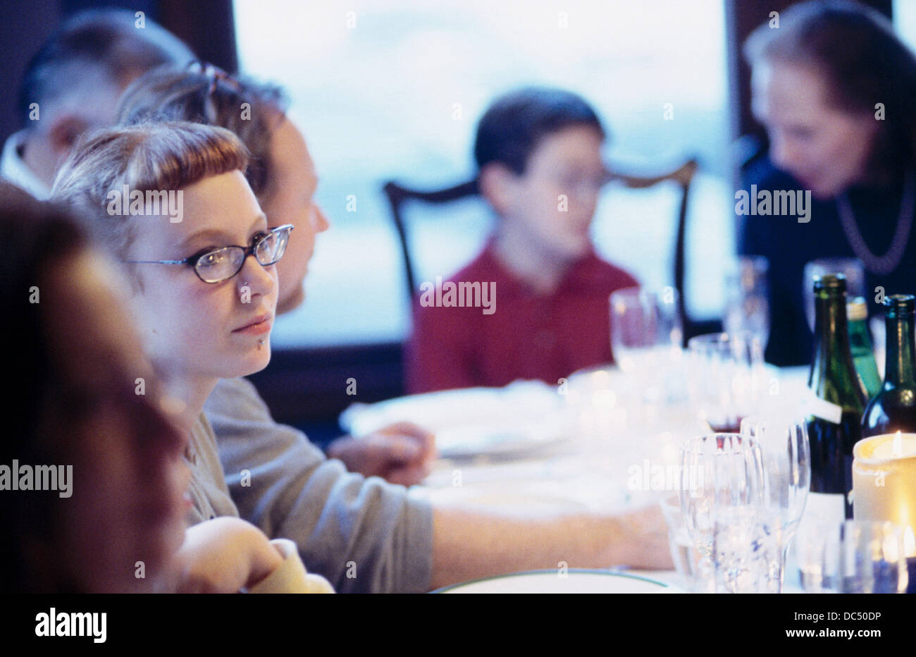 Family at dinner table Stock Photo - Alamy