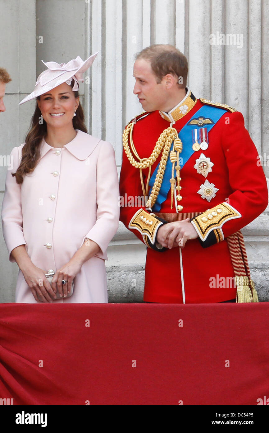 Catherine, Duchess of Cambridge (L) and Prince William, Duke of Cambridge stand on the balcony of Buckingham Palace during the T Stock Photo