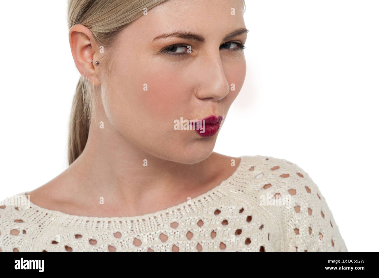 Flirtatious teen watching you closely Stock Photo Alamy