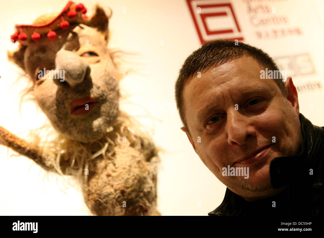 Shaun Ryder with a sculpture of himself by Michele Rashman at