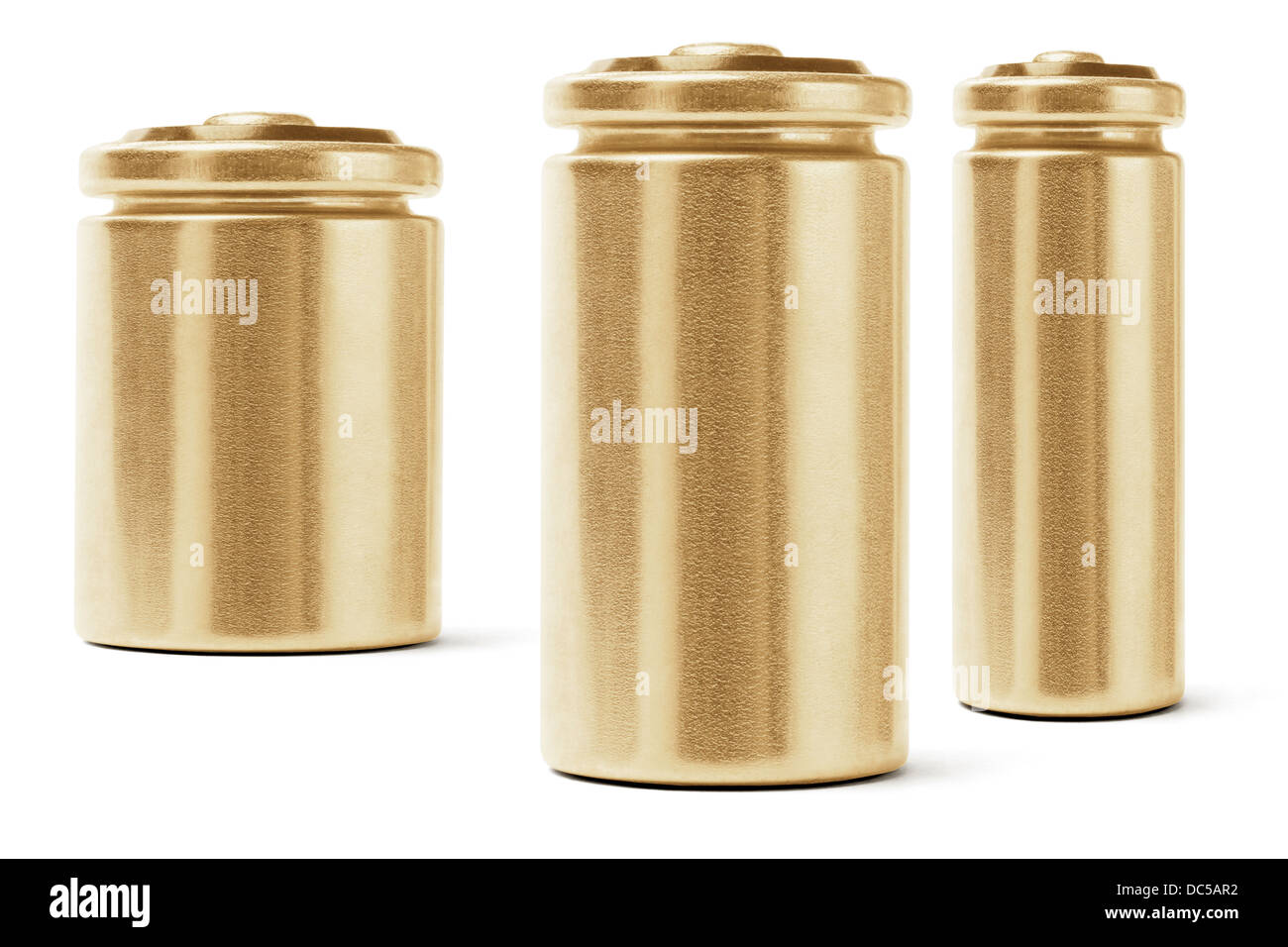 Three Gold Color Batteries On White Background Stock Photo