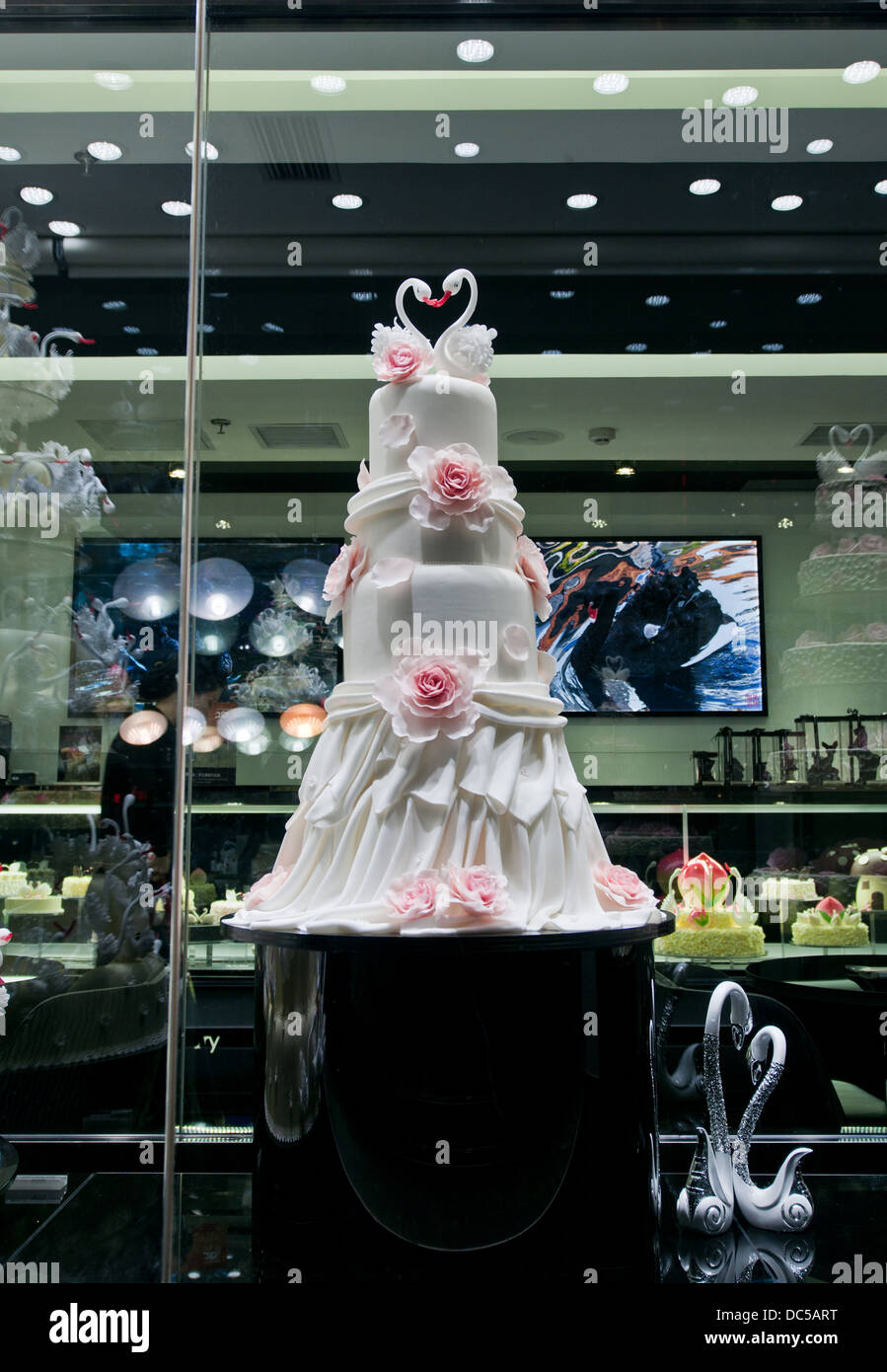 Wedding cake in Swan Luxury shop in Beijing, China Stock Photo - Alamy