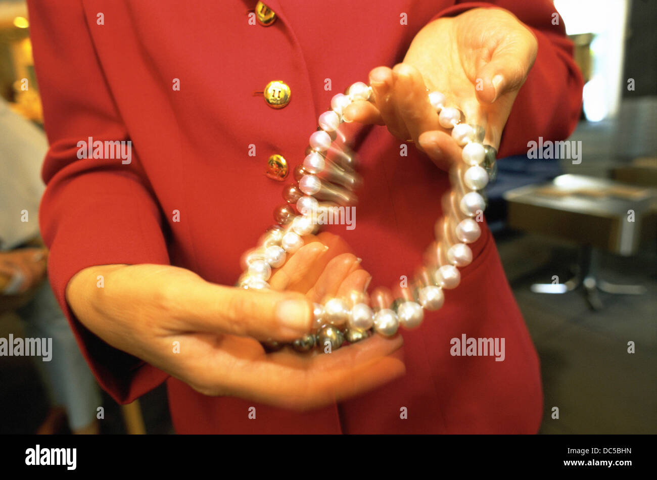 Beverly hills jewelry, vendor showing big pearls. Los Angeles. Ca. USA