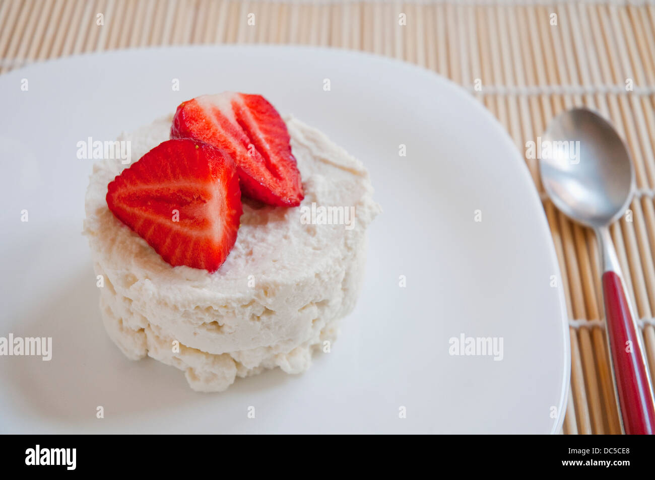 Curd cheese with strawberry. Close view. Stock Photo