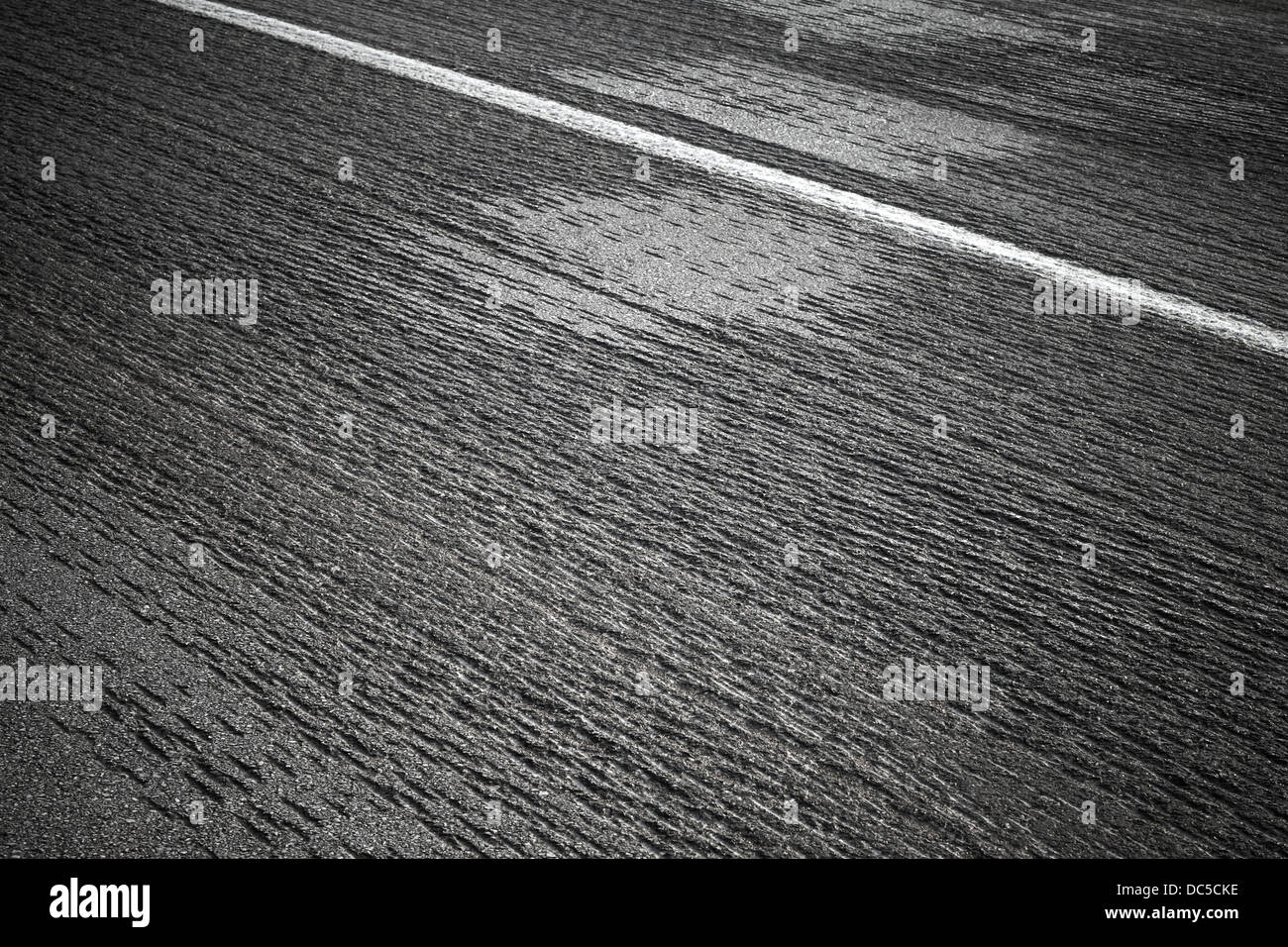 Relief asphalt road with white line marking Stock Photo