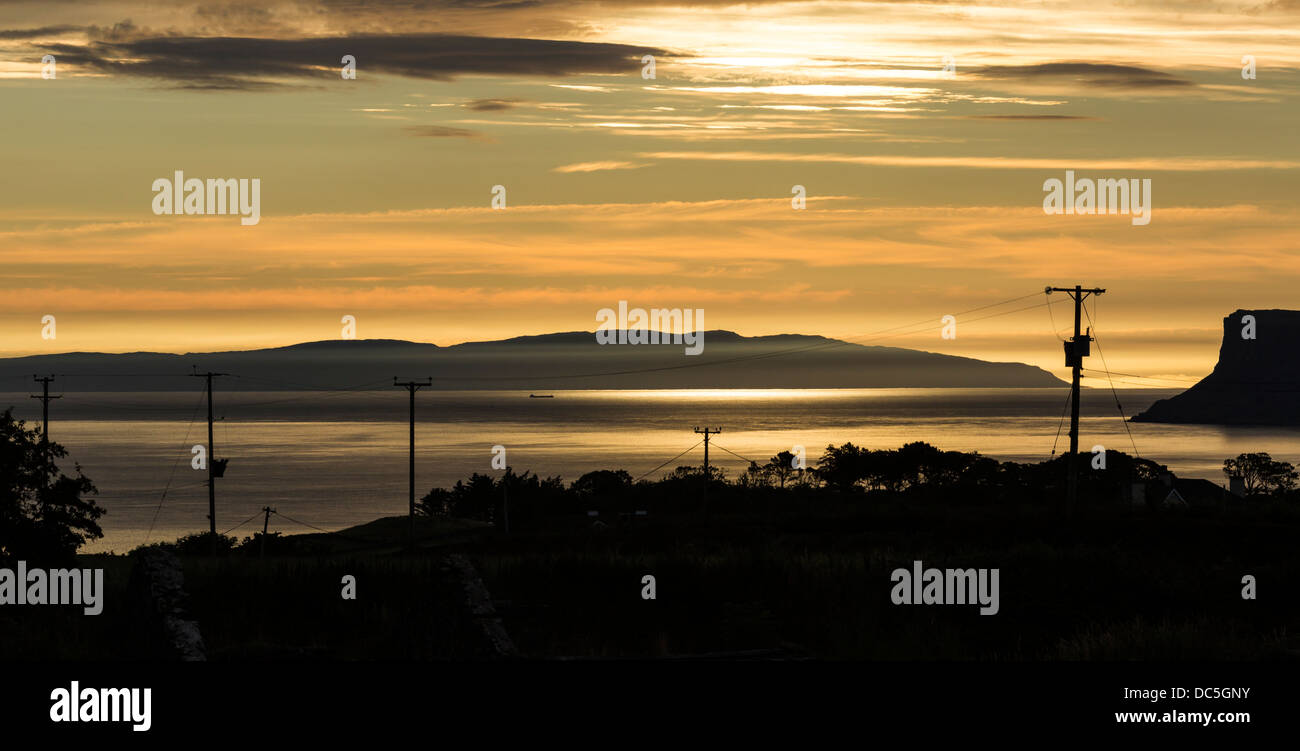 Electric Sunrise, after the Golden Hour, over the Mull of Kintyre as seen from North Antrim, Northern Ireland Stock Photo