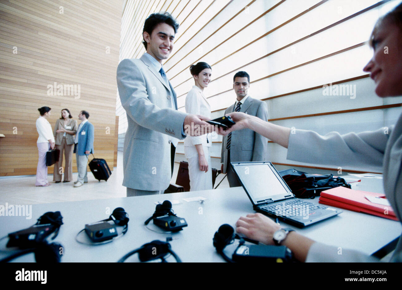 Distribution of simultaneous translation devices at business trade show