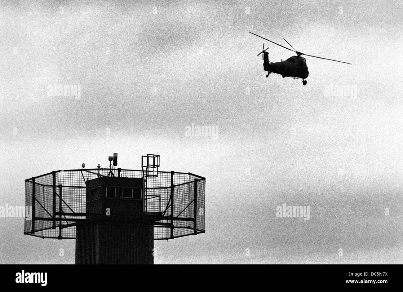 British Army Wessex helicopter takes off from fortified Dungannon base in County Tyrone Northern Ireland 1993 Stock Photo