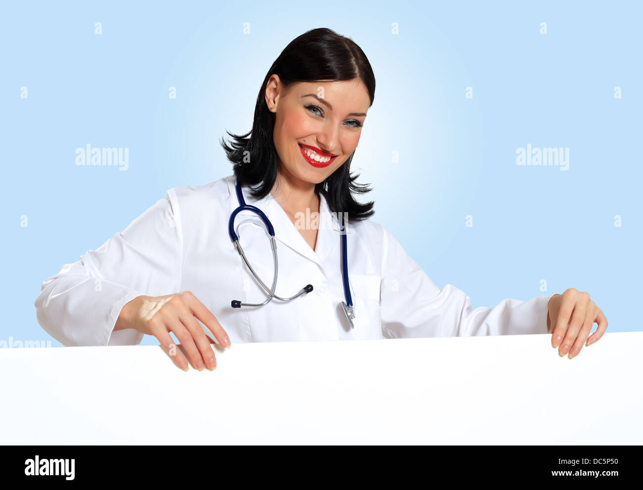 Young female doctor with a banner Stock Photo - Alamy