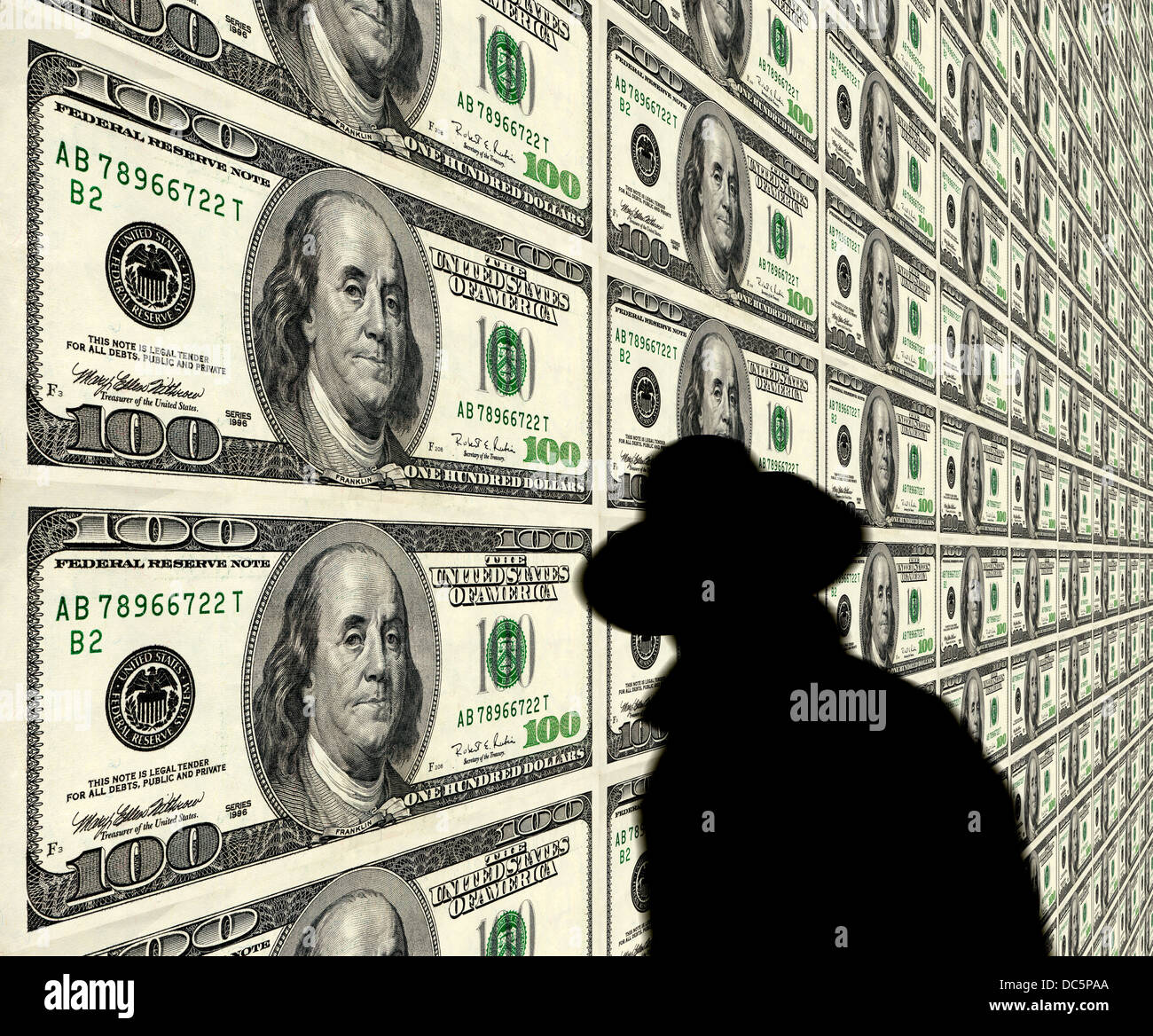 computer generated image of bad guy man lurking background of $100 dollar bills Stock Photo