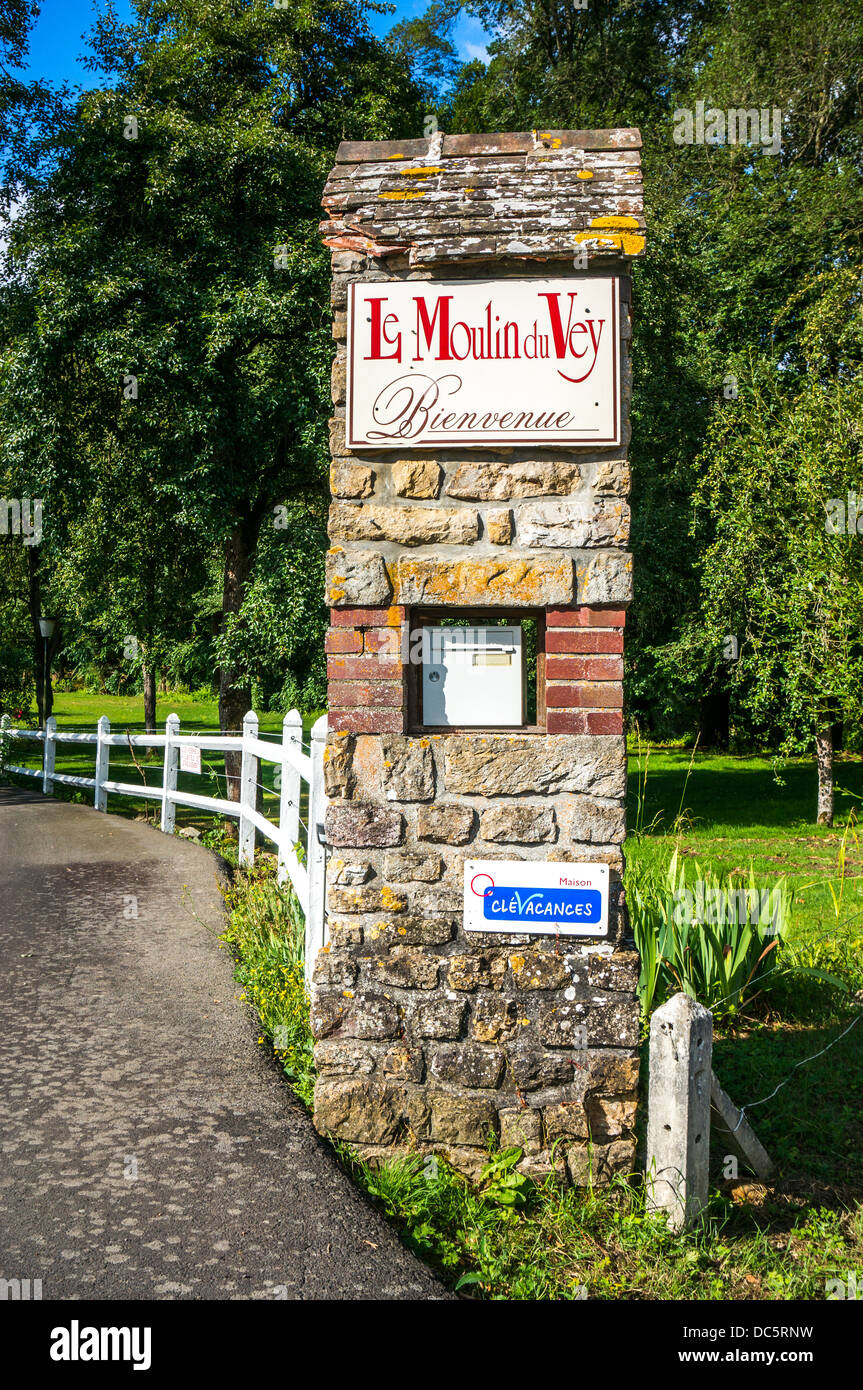 Entrance to Le moulin Du Vey hotel, near Clécy, Calvados department, Basse-Normandie, north west France. Stock Photo