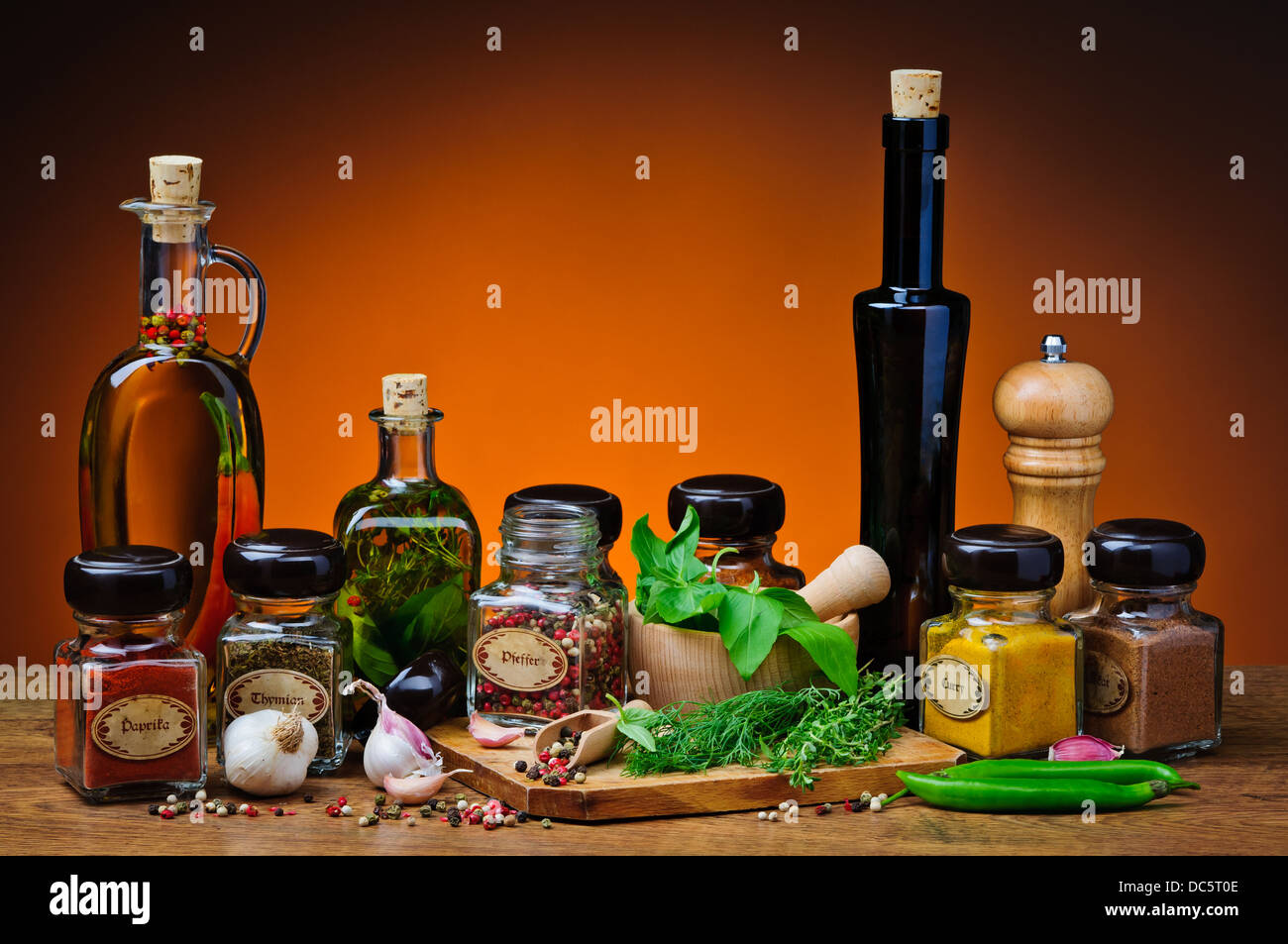 still life with herbs, spices and infused olive oil Stock Photo
