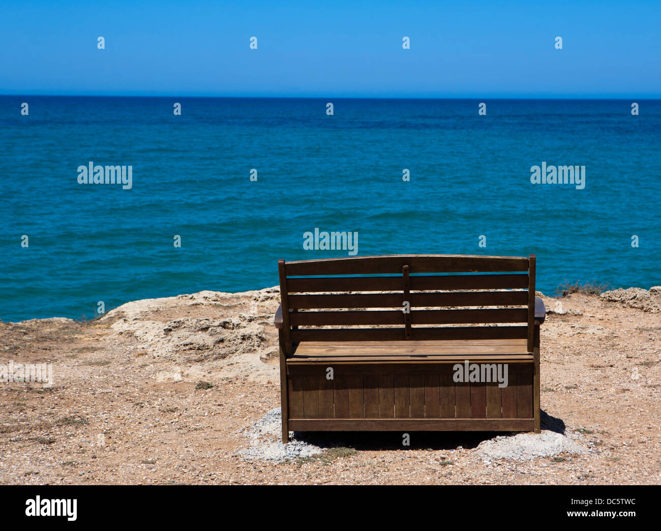 Wooden bench with a sea view Stock Photo