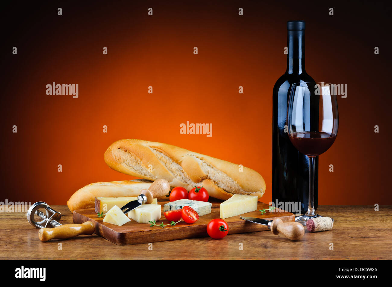 still life with traditional dinner, cheese and red wine Stock Photo - Alamy