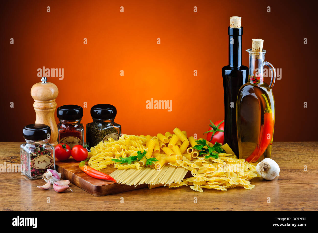 still life with italian pasta, herbs, spices and olive oil Stock Photo