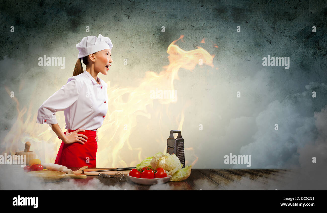 Asian female cook in anger Stock Photo - Alamy