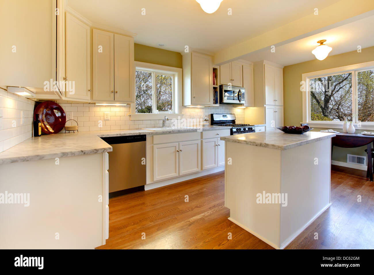 White and green kitchen with luxury design and marble countertop Stock ...