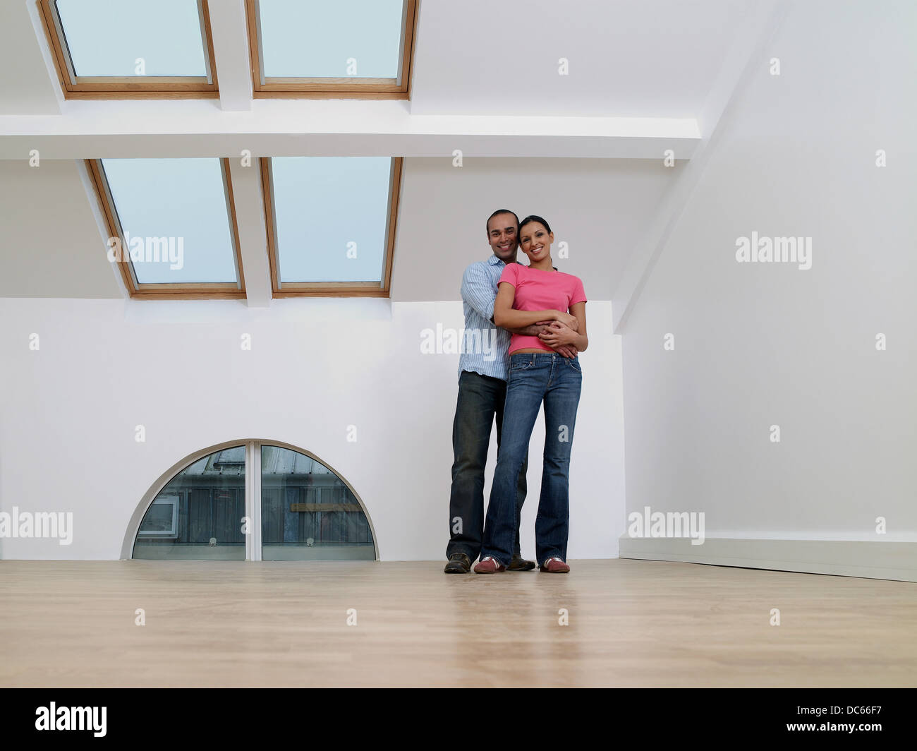 Portrait of a couple in a new home Stock Photo