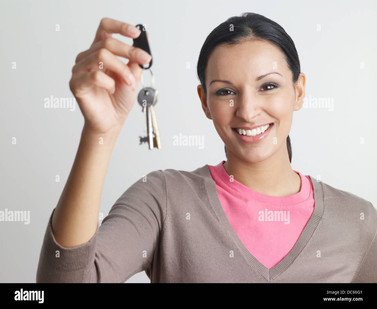 woma holds keys to new home Stock Photo
