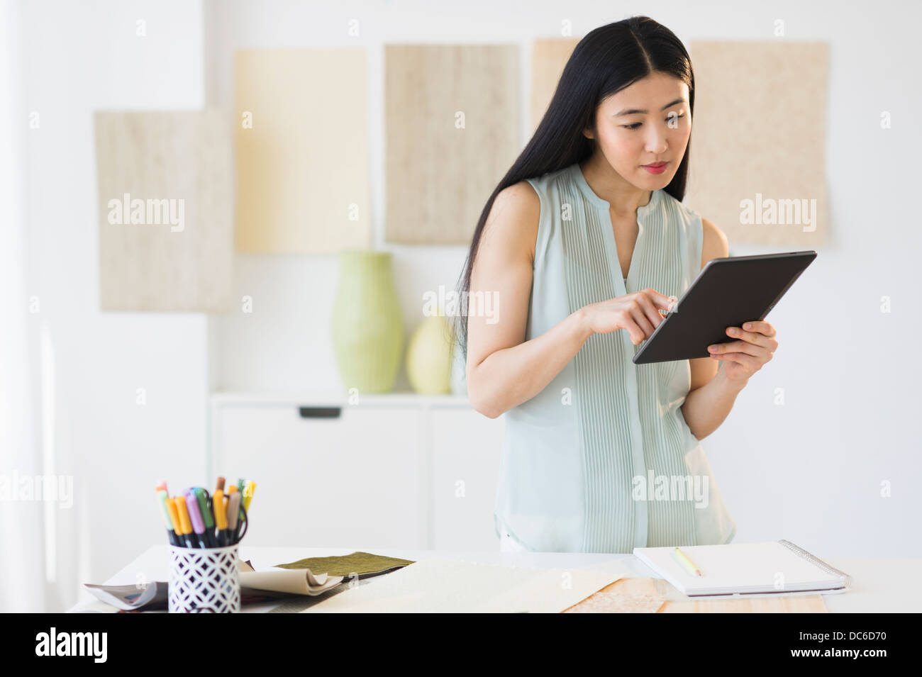 Business woman using tablet pc Stock Photo