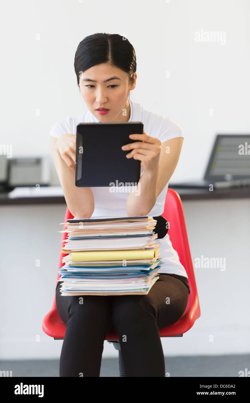 Businesswoman using tablet pc Stock Photo