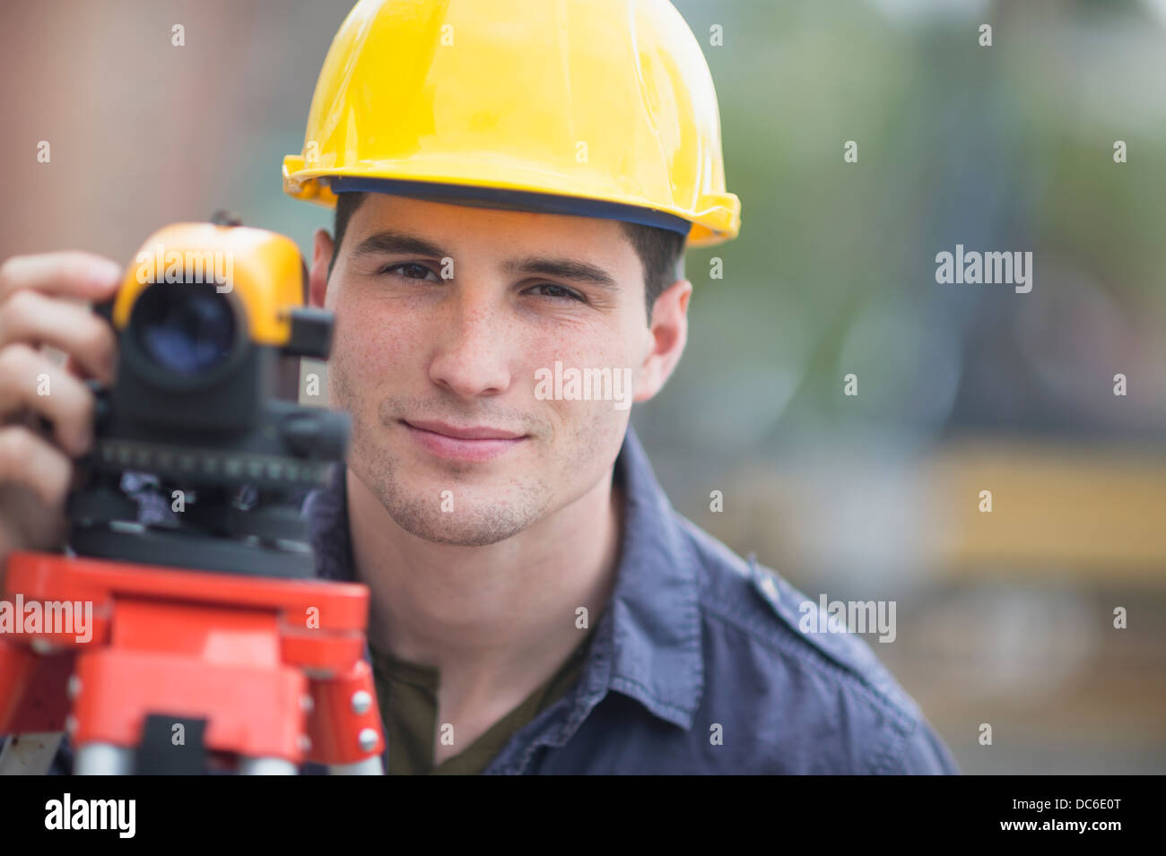 Engineer using theodolite Stock Photo