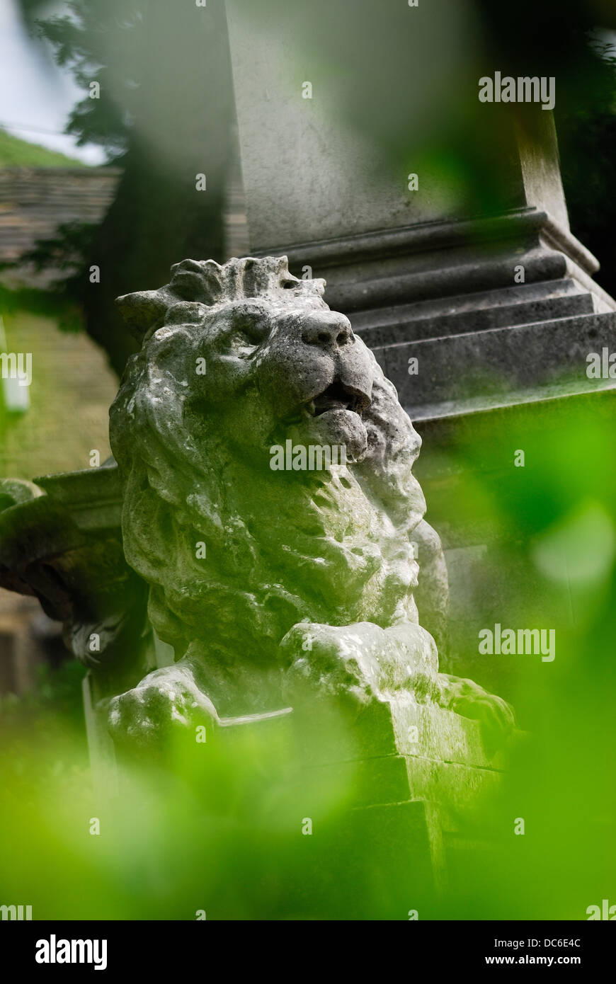A stone statue in the shape of a Lion Stock Photo