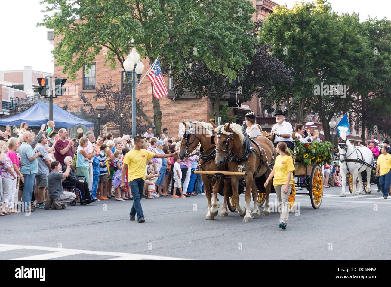 August 2, 2013, Saratoga Springs, NY.  Participants move down Broadway in the annual 'Floral Fete Promenade.' Stock Photo