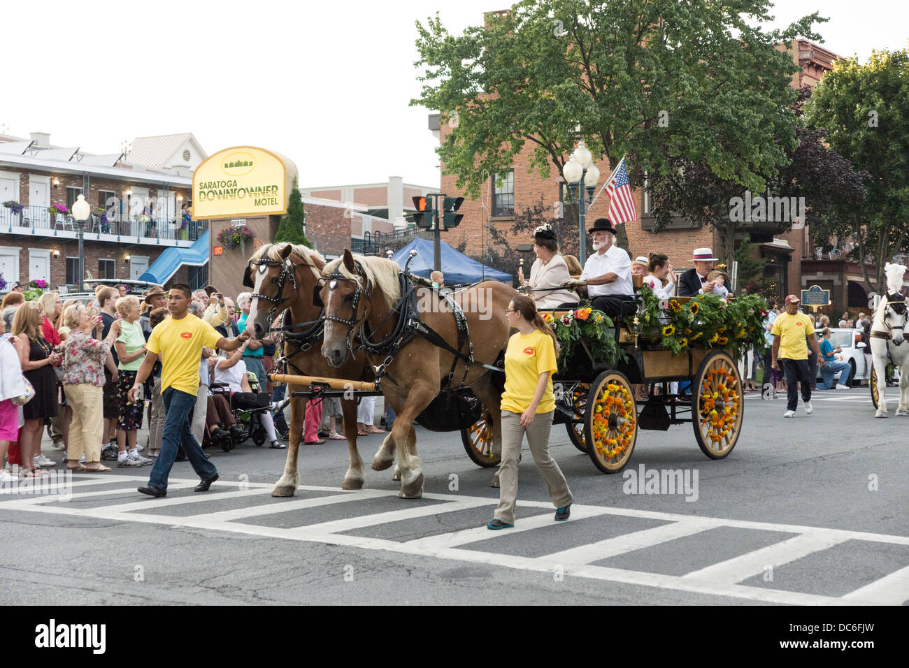 August 2, 2013, Saratoga Springs, NY.  Participants move down Broadway in the annual 'Floral Fete Promenade.' Stock Photo