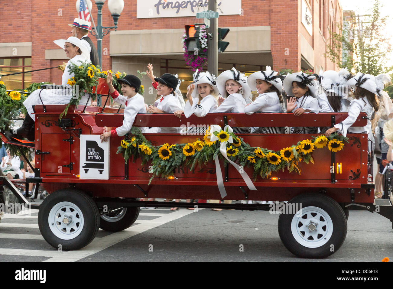 August 2, 2013, Saratoga Springs, NY.  Participants parade down Broadway in the annual 'Floral Fete Promenade.' Stock Photo
