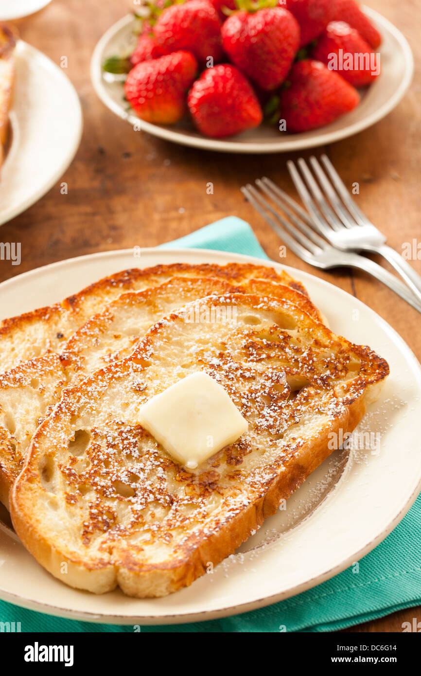Homemade French Toast with Butter and Powdered Sugar Stock Photo