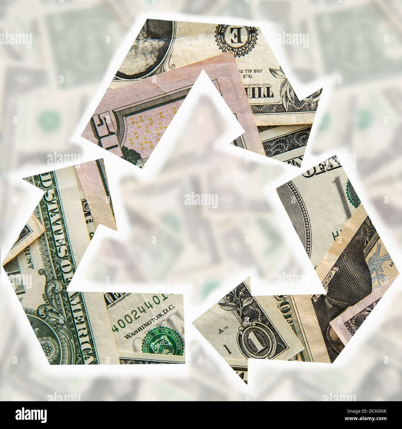 Recycling symbol made from paper money Stock Photo