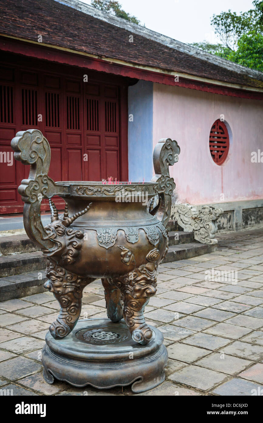 A decorative brass urn at the Thien Mu Pagoda near Hue, Vietnam, Asia