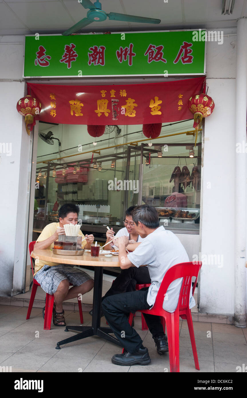 Diners at a Kopitiam (coffee shop) on Geylang Road in Singapore Stock Photo