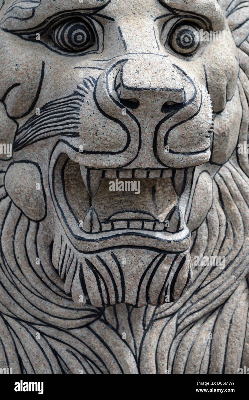 Granite chinese lion statue detail at Viharnra Sien – Anek Kusala sala. Chinese pagoda Pavilion near Pattaya Stock Photo