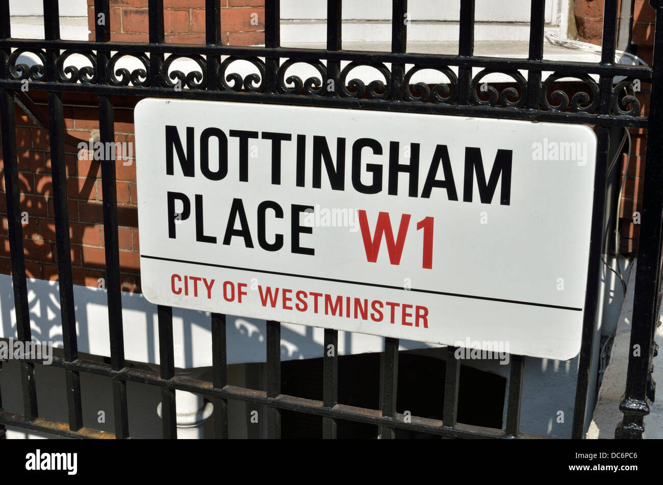Nottingham Place W1 street sign on railings, Marylebone, London, UK